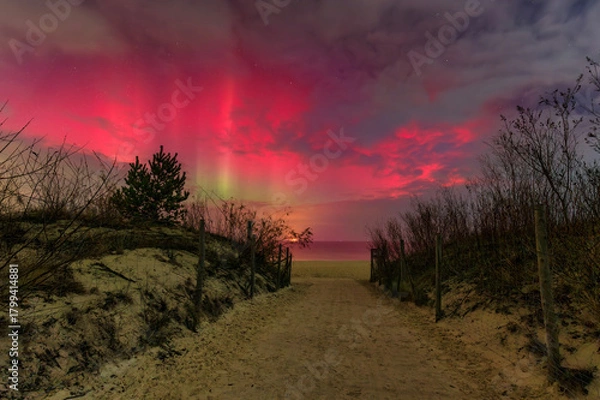 Fototapeta Aurora over the Baltic Sea beach by the Sobieszewo Island, Gdansk. Poland.