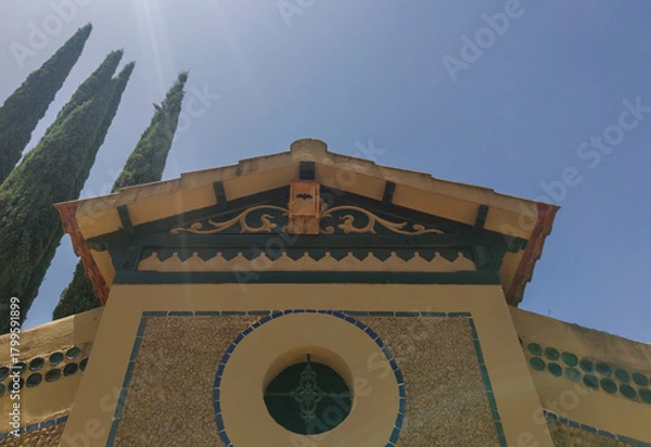 Obraz Wooden nest box or bat shelter attached under cornice