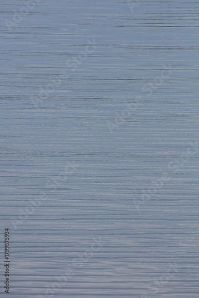 Fototapeta Abstract of small waves in sea in summer, Laajalahti, Espoo, Finland.