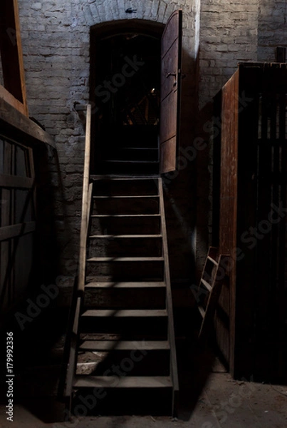 Obraz Staircase and entrace of an abandoned and old attic
