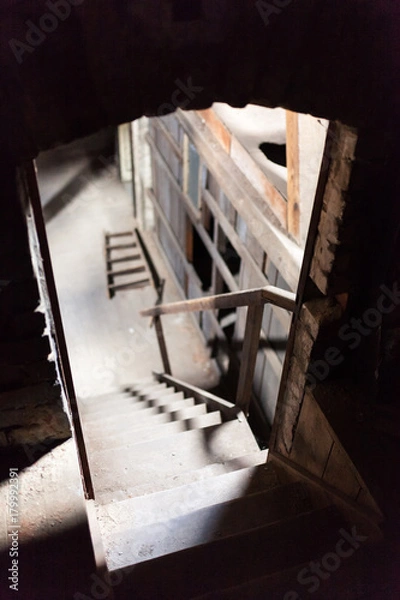 Obraz Staircase of an abandoned and old attic