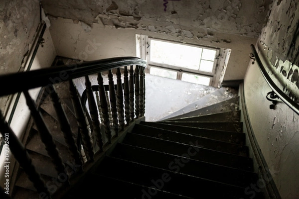 Obraz Wooden and dark staircase on an old and lost attic