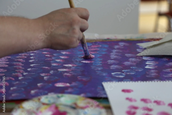 Fototapeta künstler beim malen eines bildes