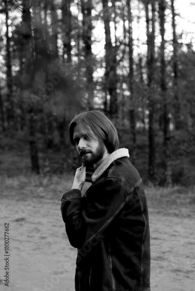 Obraz Man in Denim Jacket Looking Over His Shoulder in Forest