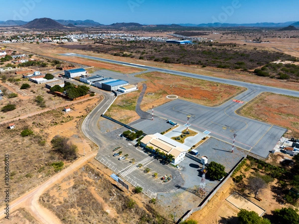 Obraz Airport, hangars and runway field well maintained