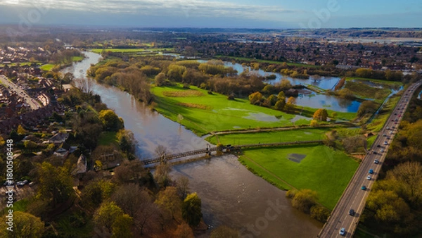 Obraz Aerial shot showing river and autumn flooding near urban area