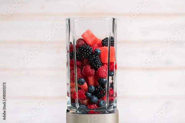 Fototapeta berries in a blender for smoothie
