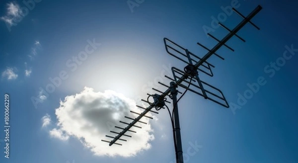 Obraz TV Antenna Against Blue Sky and Cloud