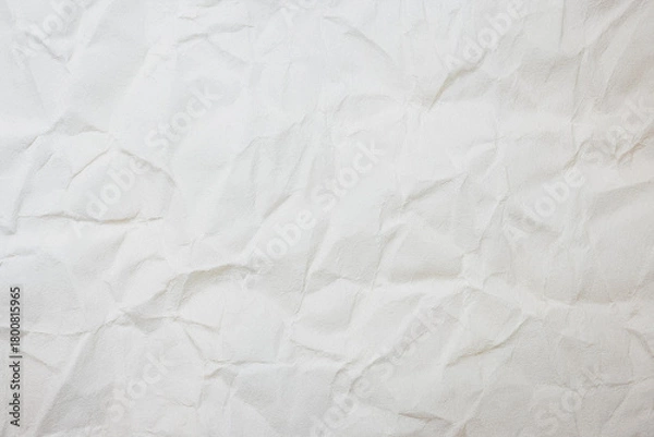 Fototapeta Crumpled White recycled craft paper texture as background.