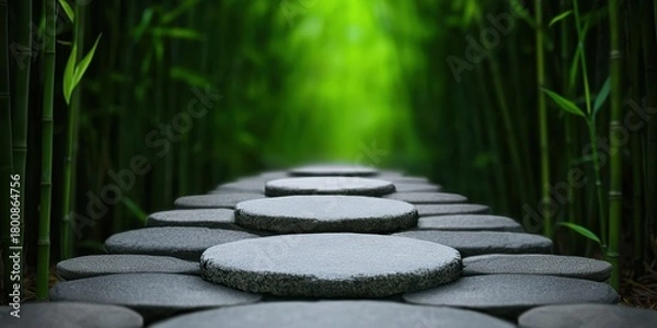 Fototapeta Wellness meditation positivity concept. Serene pathway through bamboo forest with stone steps leading into vibrant greenery.
