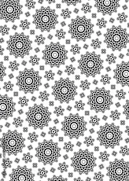 Fototapeta This is a monochrome seamless background with geometric floral and starburst shapes. The repeat pattern features black elements against a white backdrop.