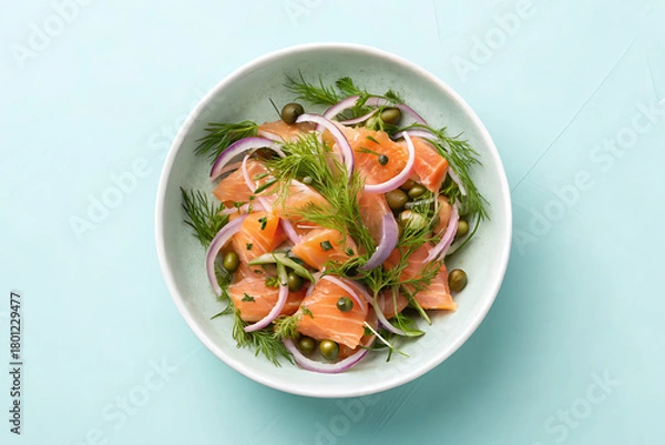 Fototapeta Fresh salmon salad with citrus and herbs in a white bowl