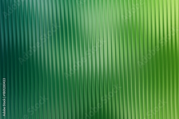 Fototapeta Green and teal abstract background with vertical lines and soft lighting