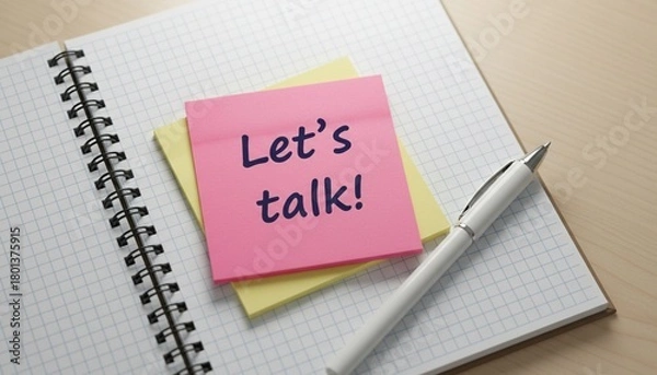 Fototapeta Let's Talk message on pink sticky note on spiral notebook with pen, symbolizing open communication