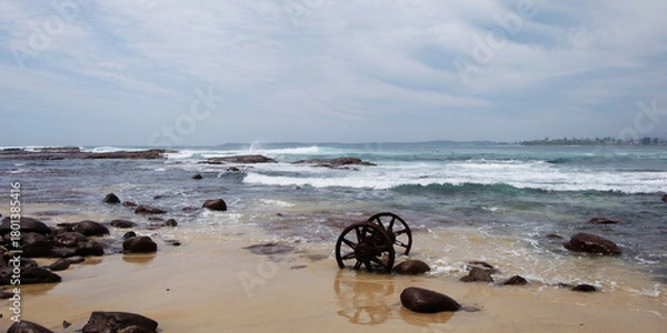 Obraz Rusted abandoned Wheels on a beach