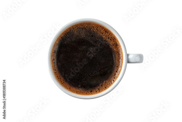 Obraz A top-down view of a white mug filled with dark, frothy coffee