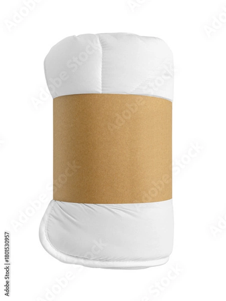 Obraz Rolled white quilted blanket or comforter tied with a blank kraft paper band, isolated on a white background. Texture of quilted fabric.Perfect for textile and bedding mockups, packaging, store design