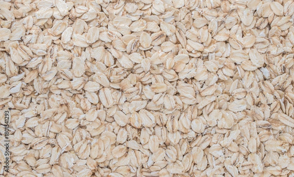 Fototapeta Pressed oat. Full screen pressed oat grains.