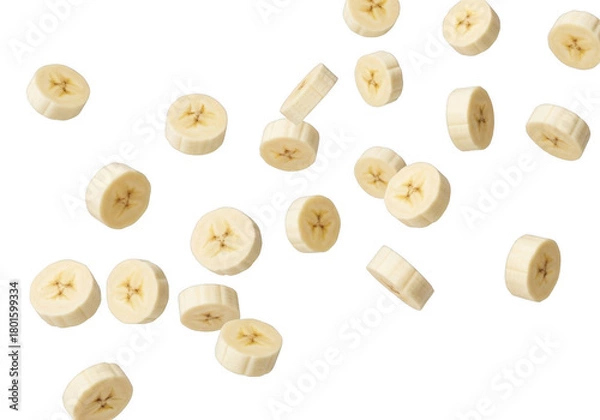 Fototapeta Falling Banana Slices on Transparent Backdrop. Nutritious and Yummy. Ideal for Tropical Themed Dessert, Smoothie and Snack Designs