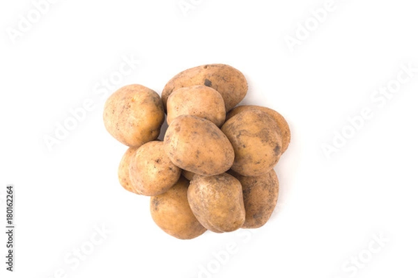 Obraz Pile of raw potatoes on a white background