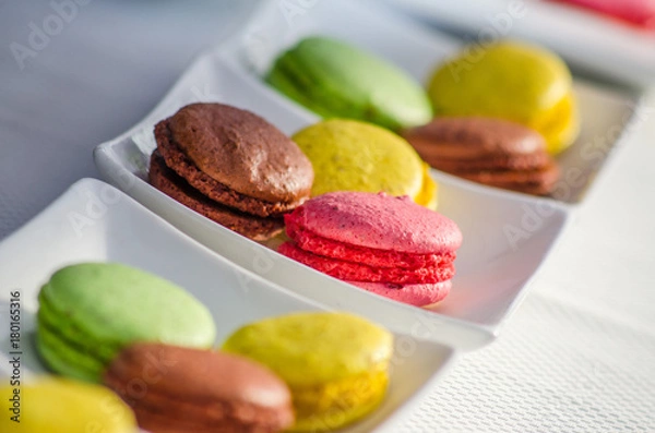 Obraz macaroons on a buffet table with desserts