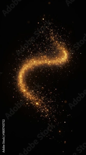 Fototapeta Golden swirling particle trail forming glowing abstract motion shape on dark vertical background.