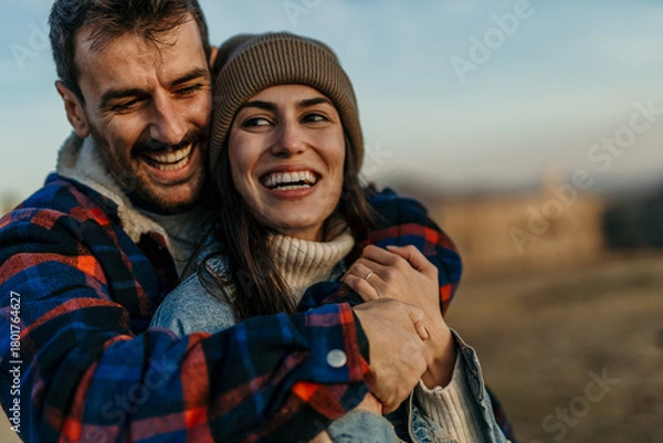Obraz Happy couple hugging outdoors enjoying autumn day