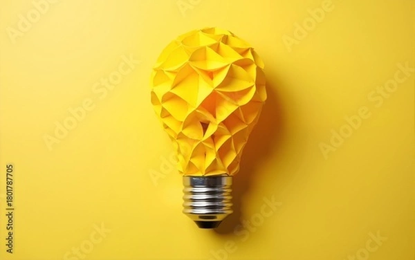 Obraz Light bulb made of yellow scrap paper ball, creative thinking concept. High quality