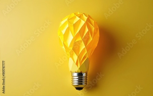 Obraz Light bulb made of yellow scrap paper ball, creative thinking concept. High quality