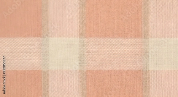 Fototapeta Soft peach and cream plaid fabric texture displaying a warm and inviting classic checkered pattern, perfect for cozy home decor, rustic fashion, or charming background designs