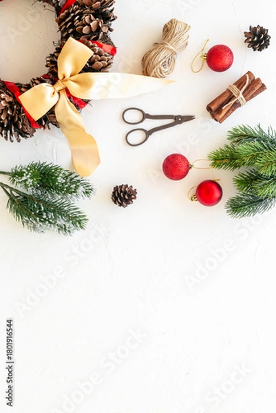 Fototapeta New Year DIY decoration - Christmas wreath with accessories, top view