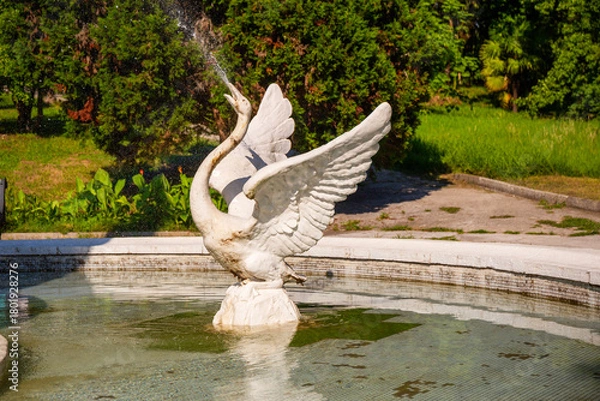 Obraz Sochi, Russia - July 04, 2020: Skazka Fountain swan close up in the Sochi Arboretum park of unique subtropical flora and fauna in Sochi resort city in Krasnodar Krai, Russia