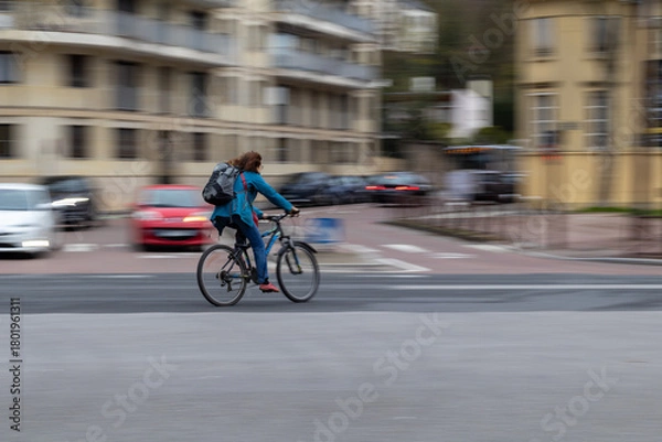 Obraz man riding a bicycle