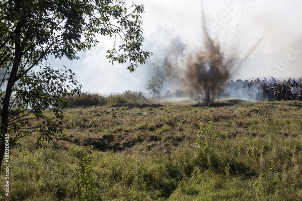 Obraz Explosion in the forest, September 24, 2017 in Russia, Leningrad region, Neva heel, reconstruction of the Second World War near the Neva River.