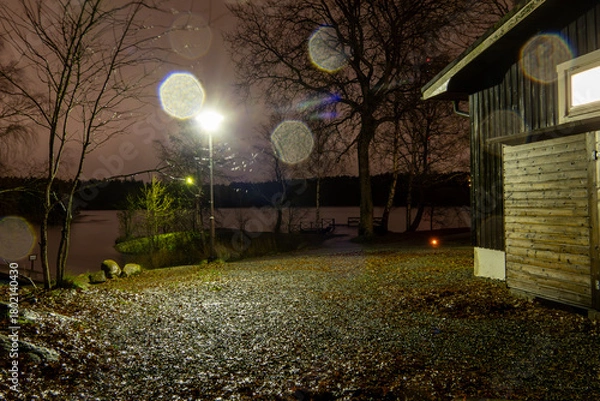 Obraz Stockholm, Sweden A night view of Källtorpssjön, a small lake in the Nacka Nature  Reserve.