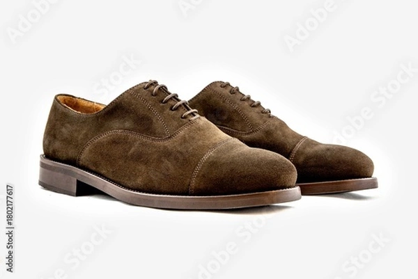 Obraz Classic leather shoes in a white background.  Classic brown suede shoe with texture.