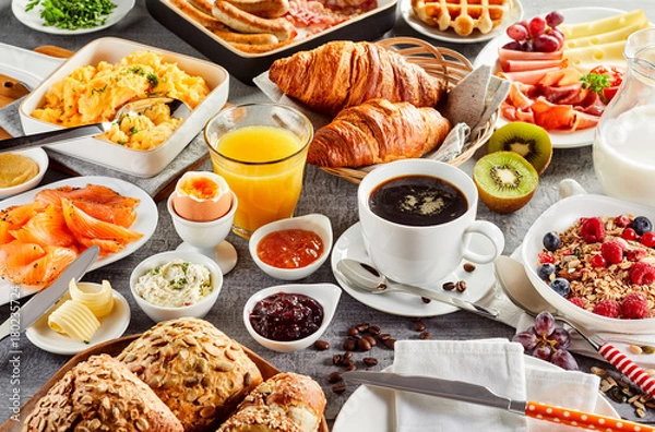 Obraz Huge healthy breakfast spread on a table