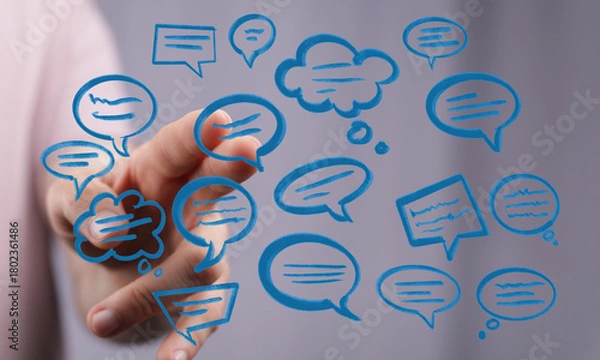 Obraz Hand touching speech bubbles, representing communication, social interaction, thoughts and ideas