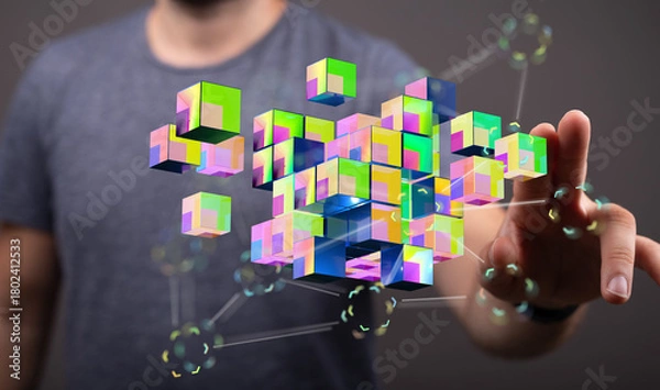 Fototapeta Man touching holographic cubes, concept of technology, data, connection, innovation, and futuristic digital wor