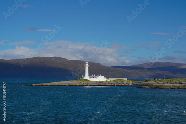 Fototapeta Lismore Lighthouse on Eilean Musdile in Scotland. It is a lighthouse on a small islet in the south west of Lismore island.