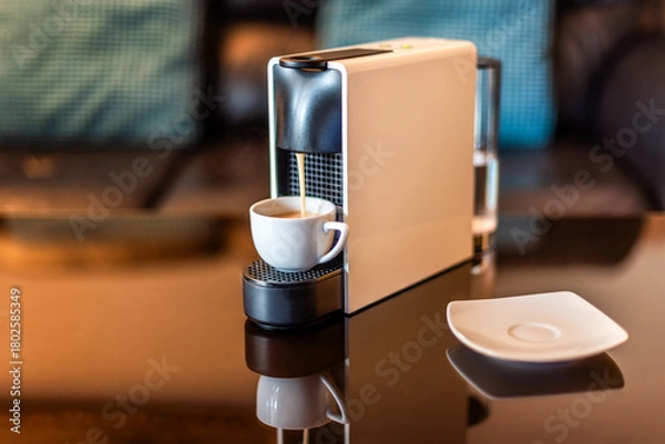 Fototapeta Morning fragrant coffee with coffee machine. Espresso coffee machine which make the cup of morning coffee, cosy living room background