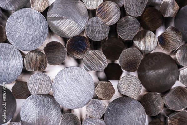Fototapeta A stack of non-ferrous metal rods, view of the cross section structure