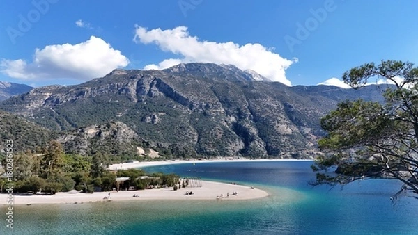 Fototapeta Mountain and Lagoon Landscape of Ölüdeniz – Aerial View of Turquoise Bay and Forested Slopes on the Mediterranean Coast of Turkey