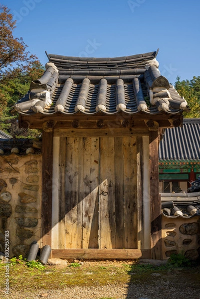Obraz Traditional Wooden Gate with Korean Tiled Roof Structure