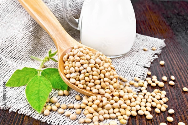 Obraz Soybeans in spoon with milk on board