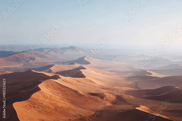 Fototapeta joyful mother and daughter share magical moment as they perform calming pose together at sunset