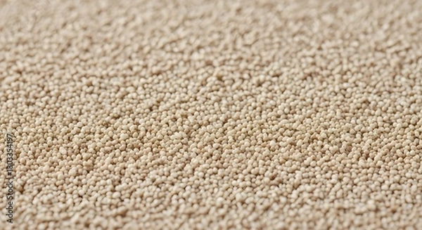 Obraz The granules appear dry and are spread across a surface, creating a texture that is dense and slightly fuzzy due to the shallow depth of field, which leaves the foreground sharp and the background blu
