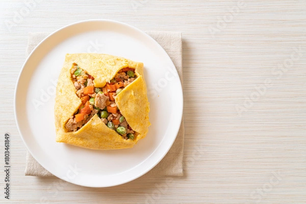 Obraz egg wrap or stuffed egg with minced pork and vegetable