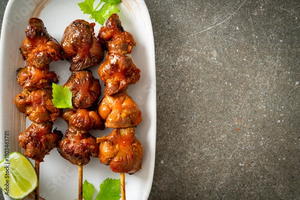 Obraz grilled chicken gizzard skewer with herbs and spices
