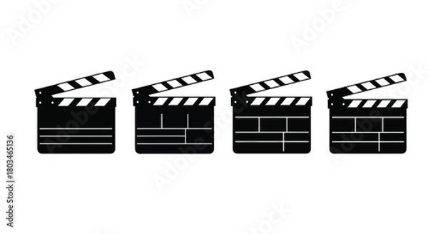 Fototapeta Four clapperboards in a row, movie industry concept